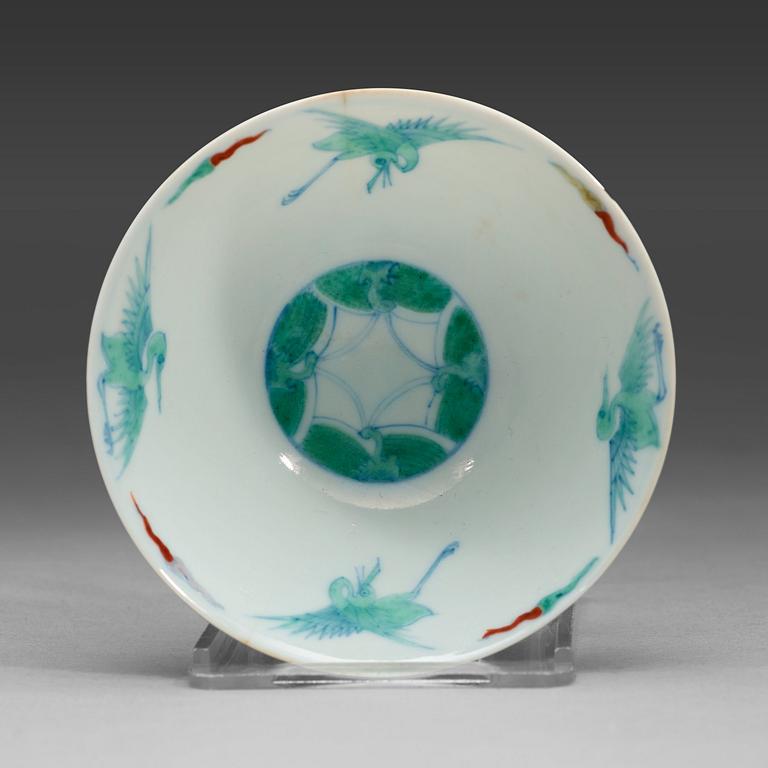 A doucai cup with cranes, Qing dynasty with Chenghuas six character mark..