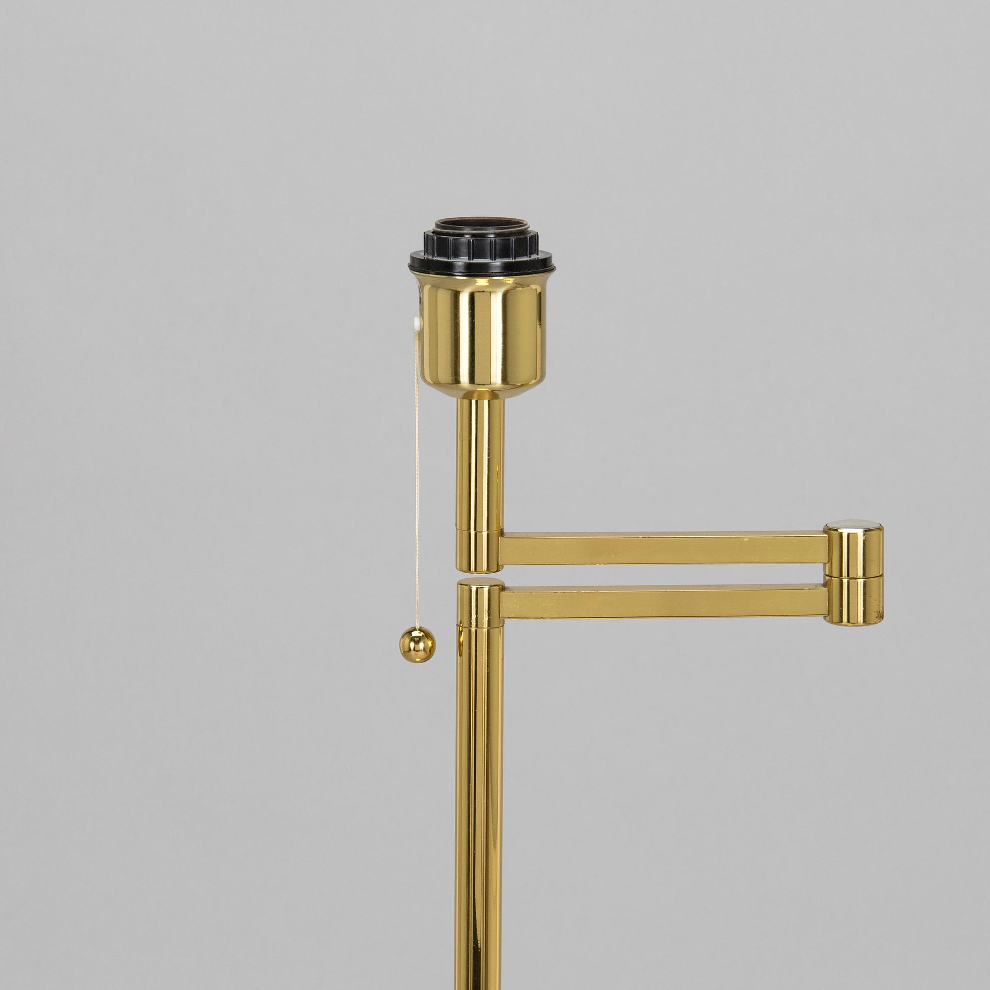 A 1970s/80s brass floor lamp, wall lamp and table lamp for Hövik verk.