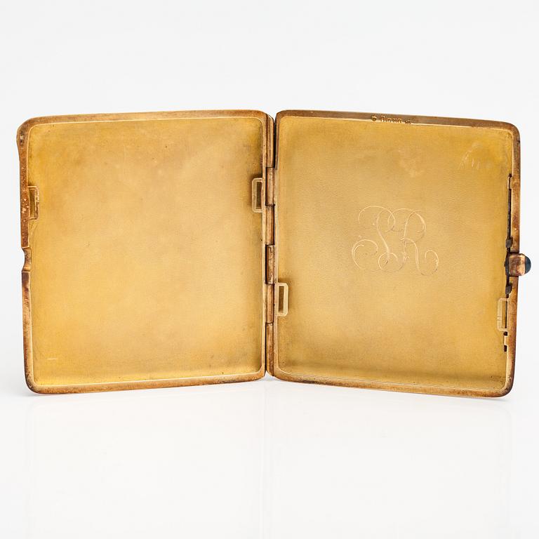 A 14K gold cigarette case. Marked Diana.