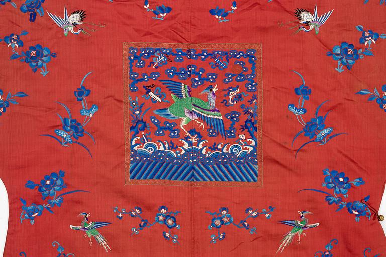 A Chinese semi-formal embroidered silk robe, late Qing dynasty, circa 1900.