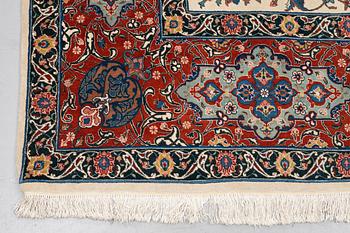 A carpet, semi-antique Tabriz, ca 379 x 280 cm.