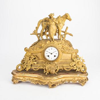 A late 19th century gilded table clock.