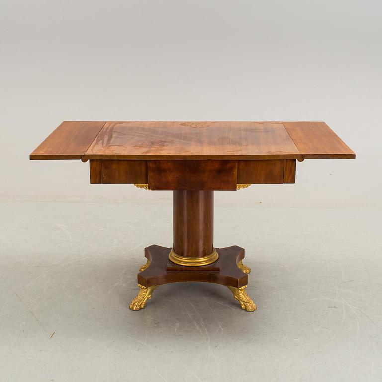 A mahogany table in Karl Johan style early 20th century.