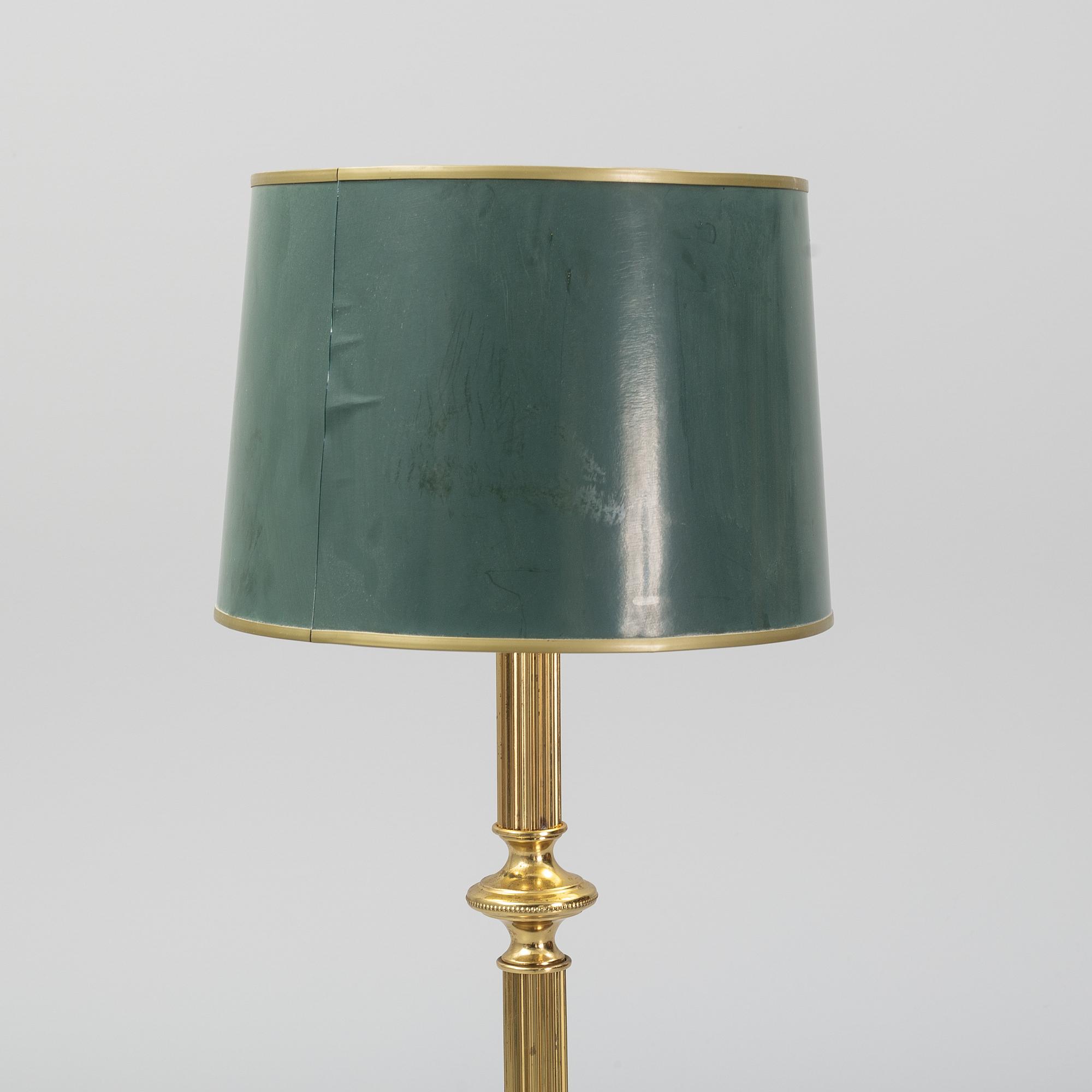 A brass floor lamp, second half of the 20th-century.