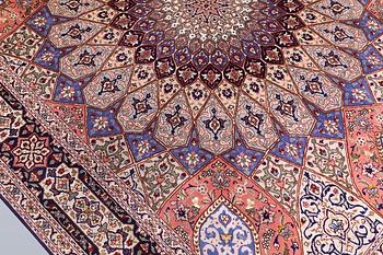 A Tabriz carpet, part silk, so-called 50 Raj, approx. 255 x 200 cm.