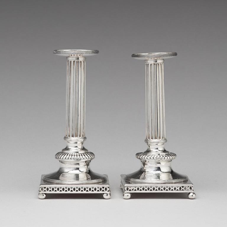 A pair of Swedish 18th century silver candlesticks, mark of Anders Castman ty, Eksjo 1798.