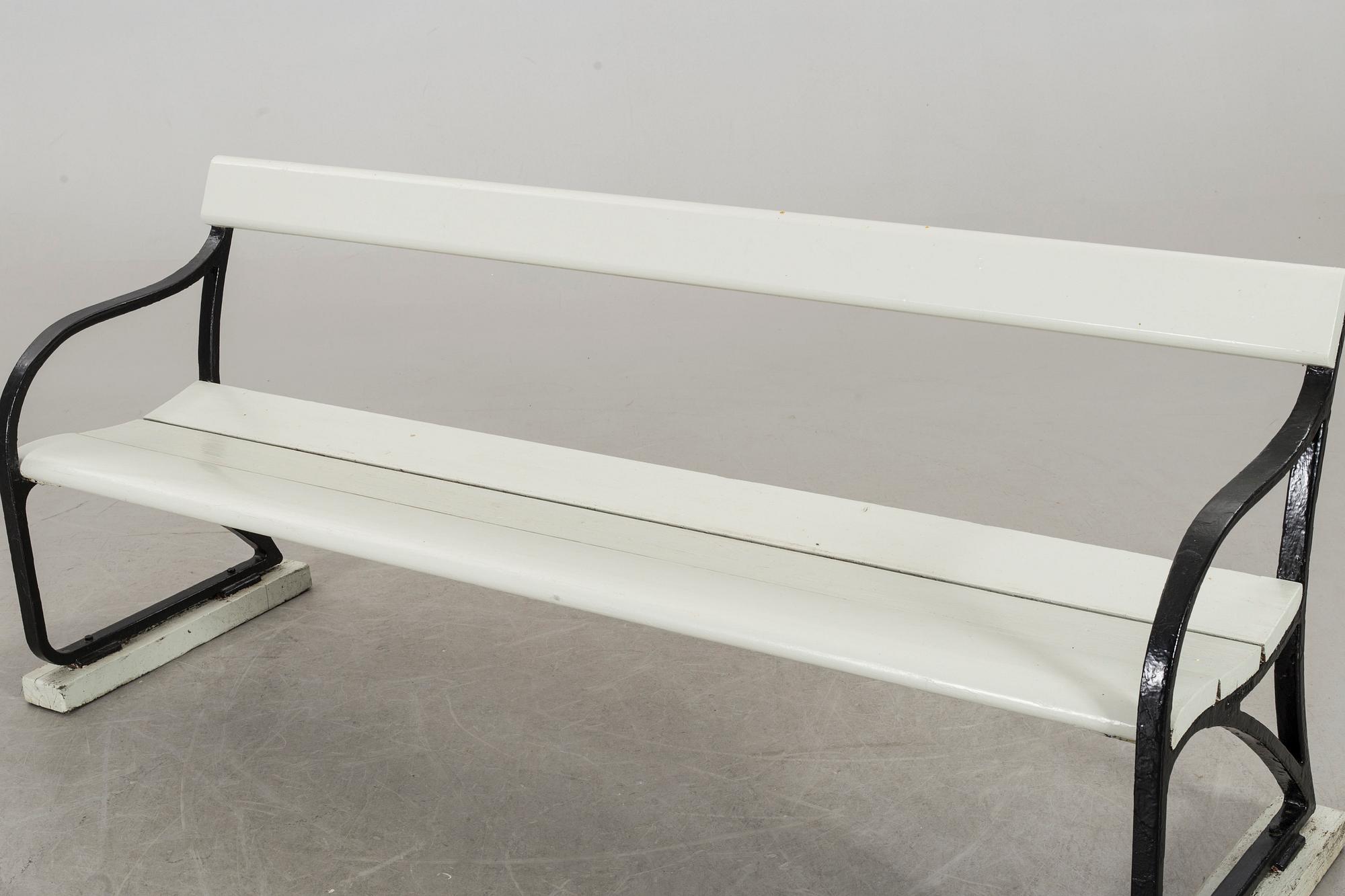 A cast iron garden sofa ends by Folke Bensow, Näfveqvarns Bruk, early 20th century.