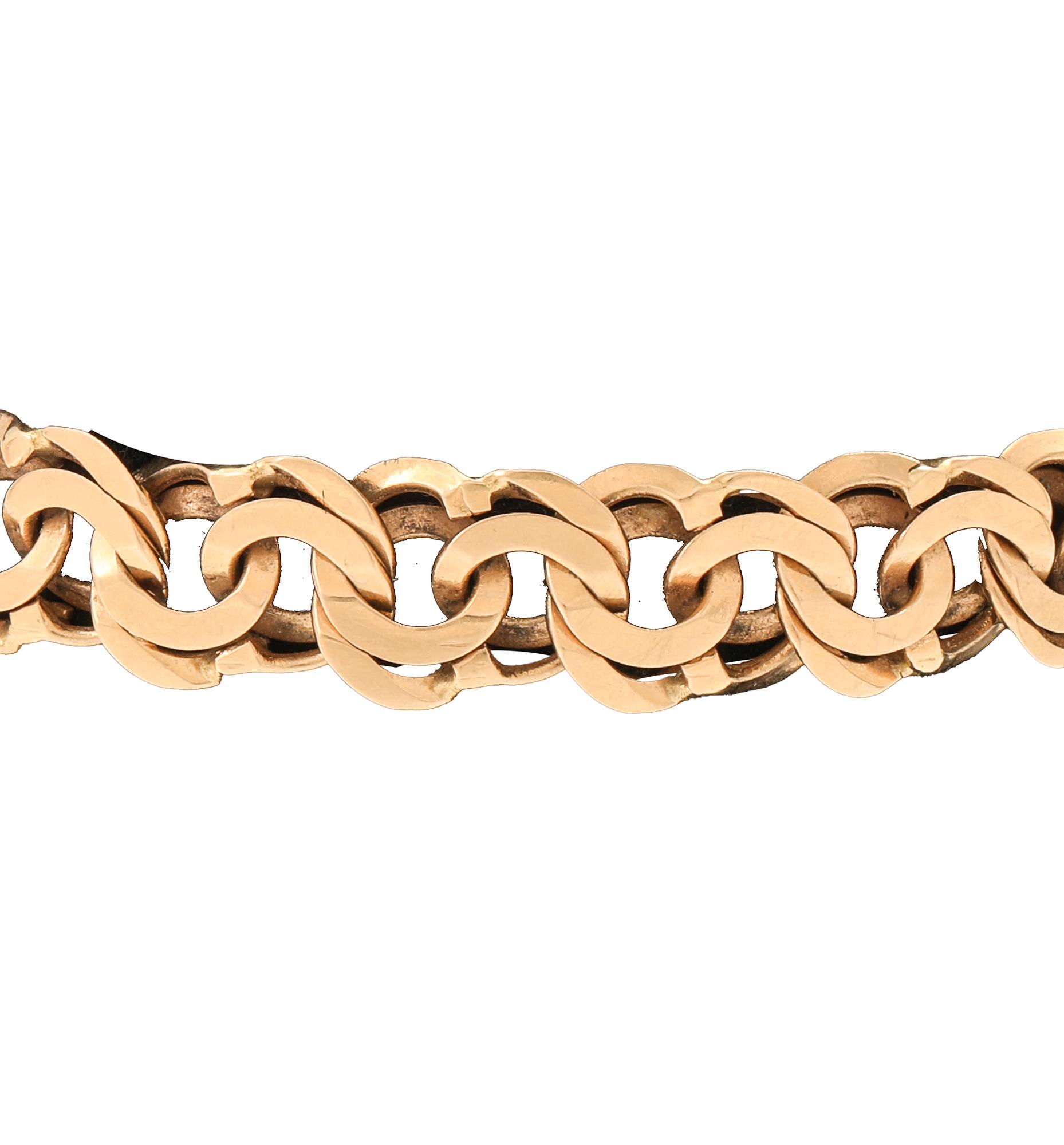 An 18K gold Bismarck bracelet.
