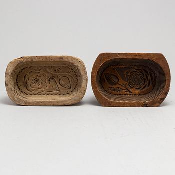 Two 19th century wooden moulds.