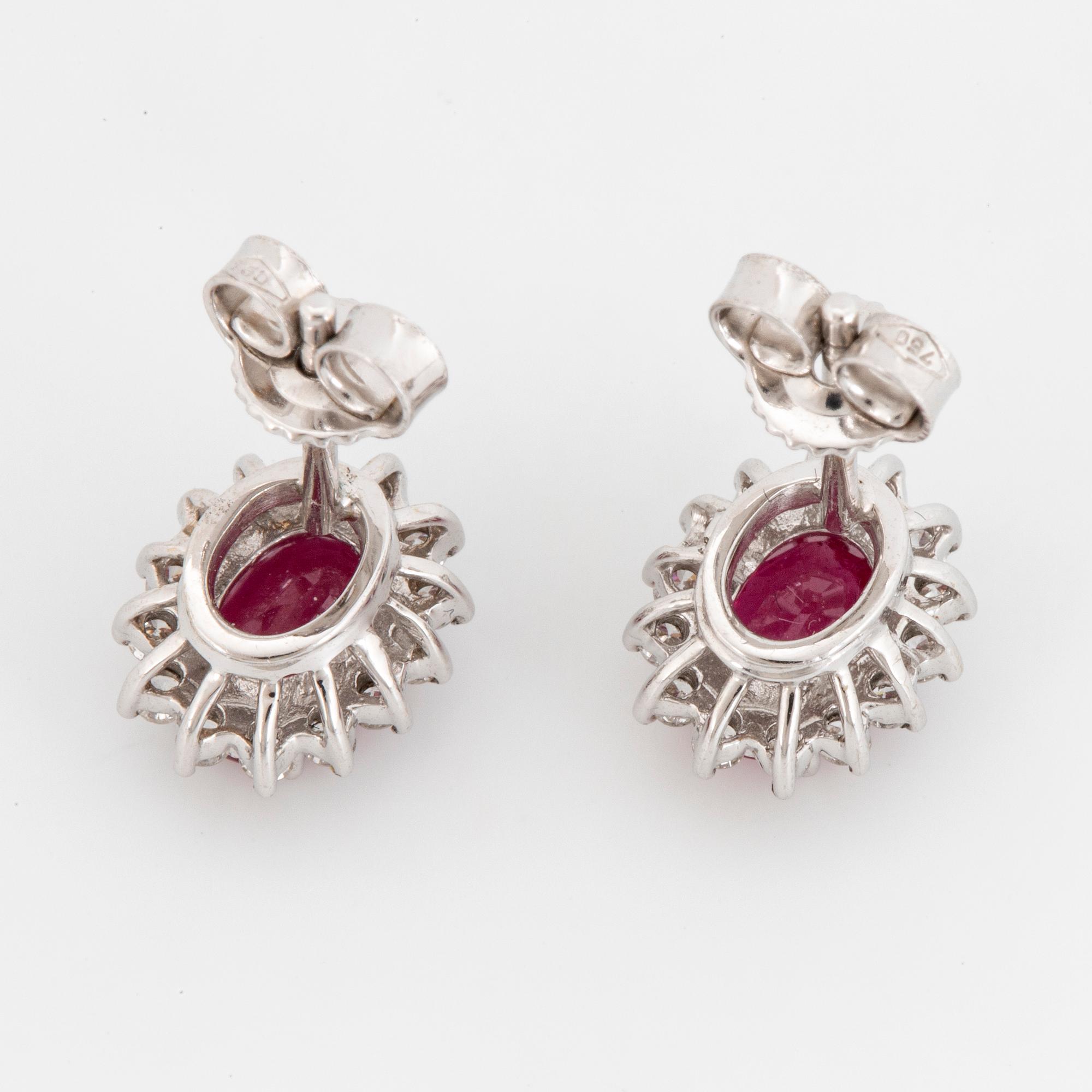 Ruby and brilliant-cut diamond earrings.