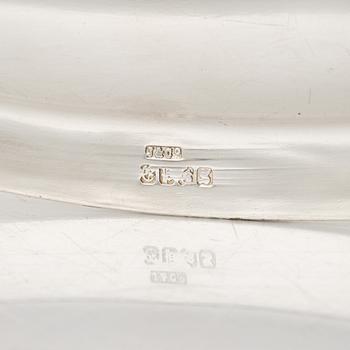 A pair of silver plated chargers, mark of Johnson & Co, Birmingham (active 1879-1899).