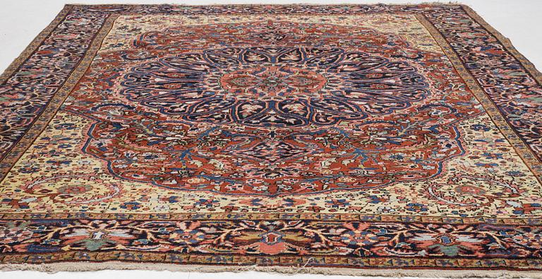A semi-antique Ahar carpet, c 335 x 275 cm.