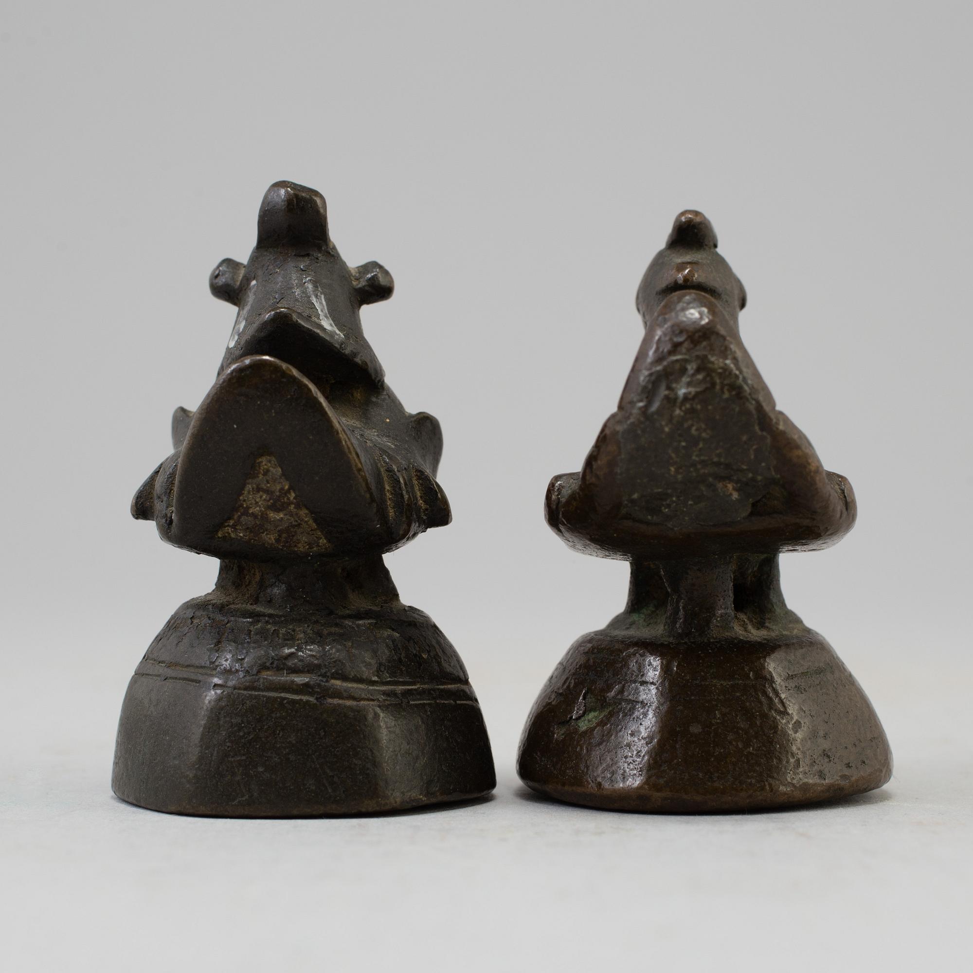 Two opium weights, Burma, circa 1900.