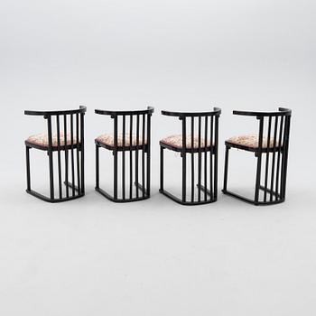 A set of four armchairs by Mundus, first half of the 20th century.