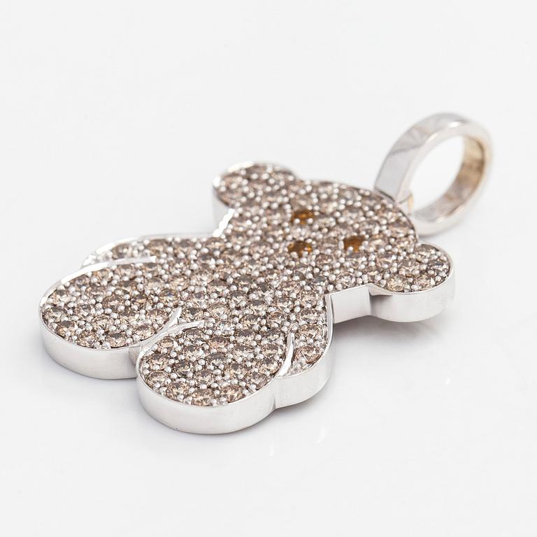 TOUS, an 18K white gold pendant in the form of a teddy bear with brownish diamonds total ca 1.09 ct, Spain.