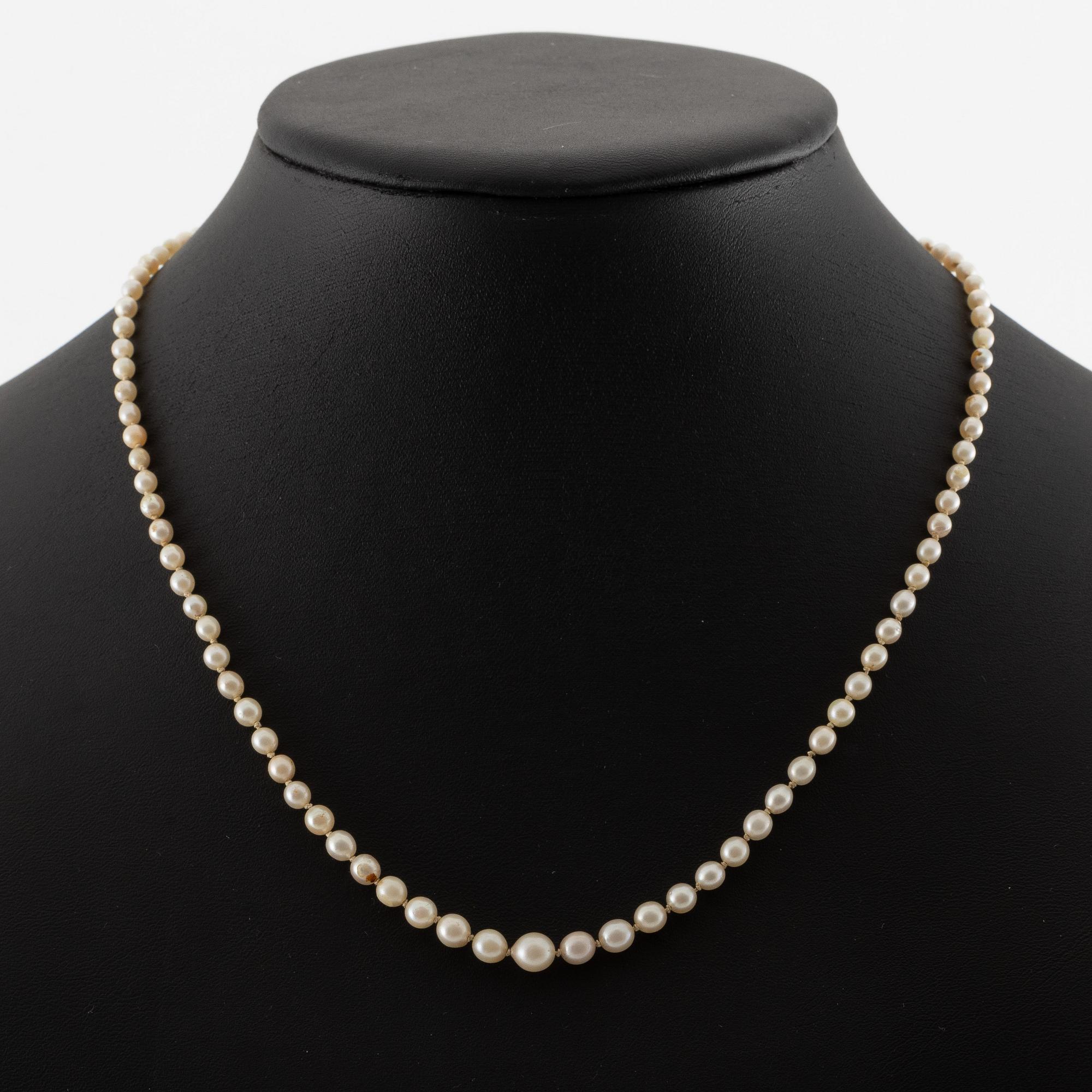 Pearl necklace, graduated pearls, clasp silver with pyrite.