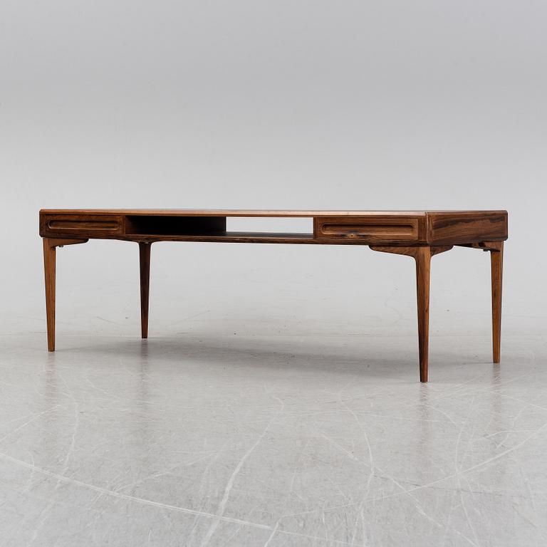 A 1960's rosewood coffee table.
