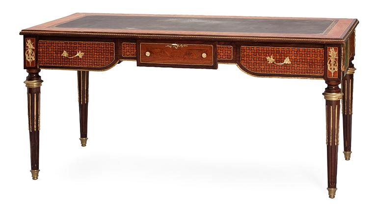 A Louis XVI-style mahogny writing desk.