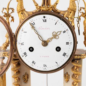 A Louis XVI marble and ormolu portico clock, the dial signed Bouchet, late 18th century.