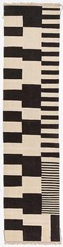 A kilim runner, c. 393 x 93 cm.