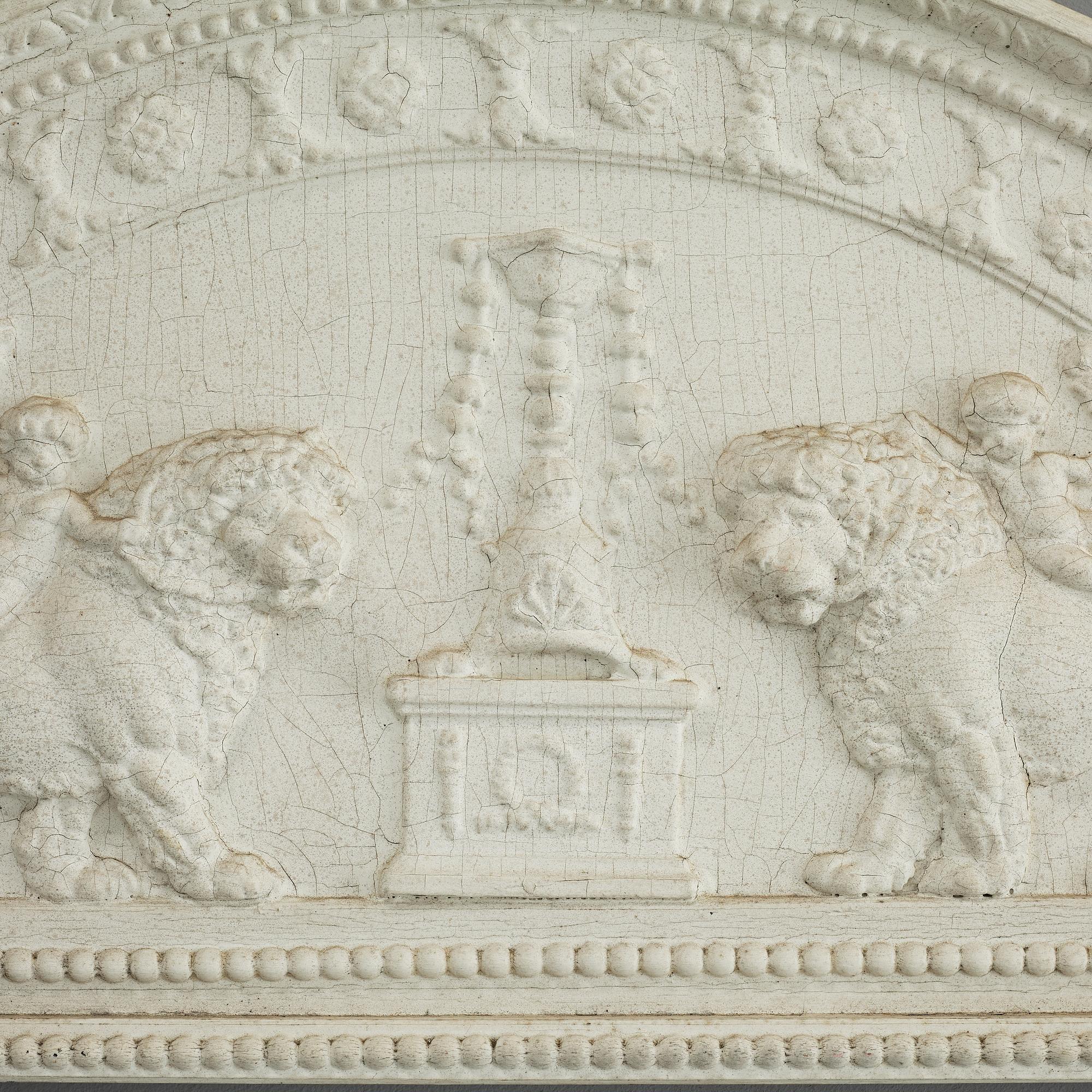 A late Gustavian carved and gesso crest, circa 1800.