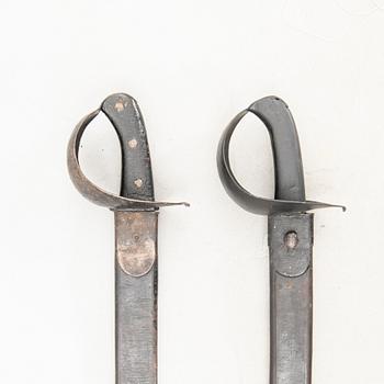 Two Swedish cutlasses 1851 navy pattern.