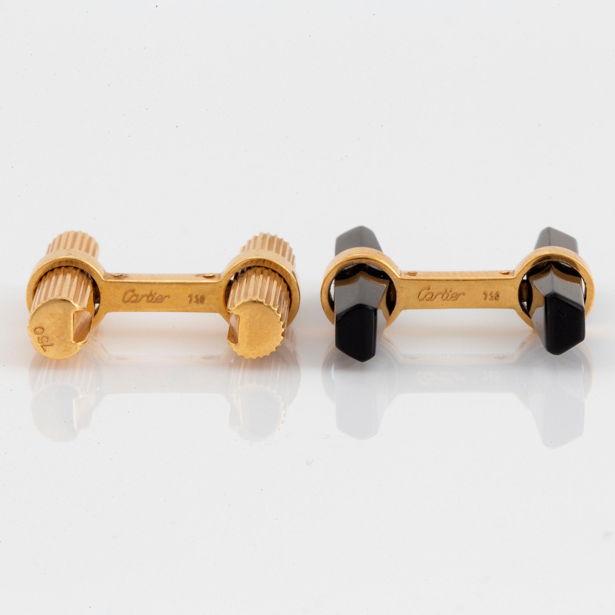 Cartier manschettknappar 18K guld och onyx.