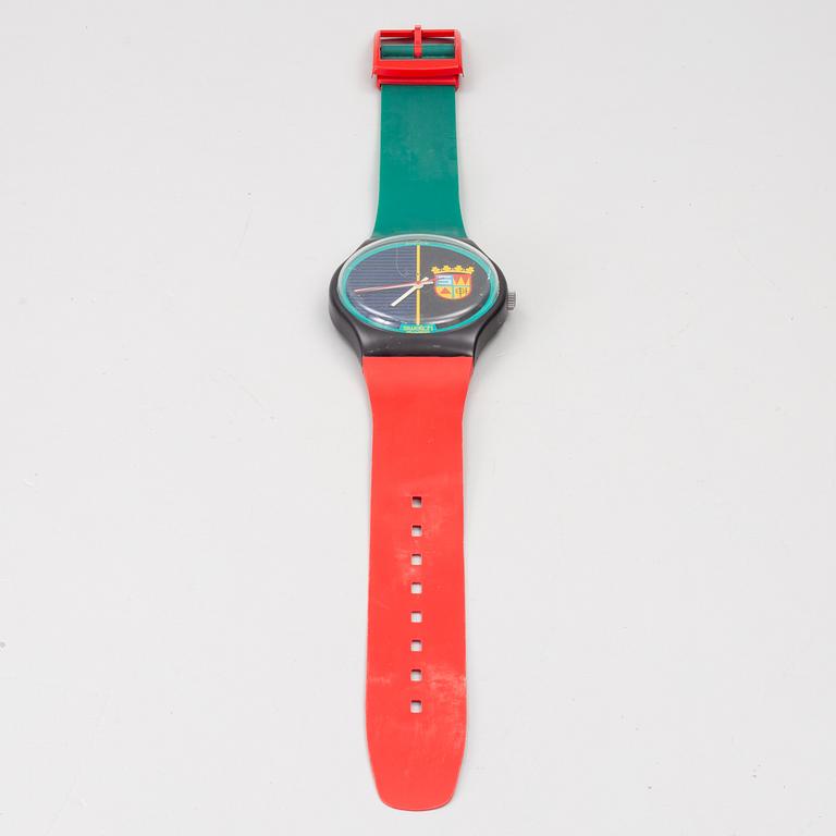 Wall clock, Swatch.