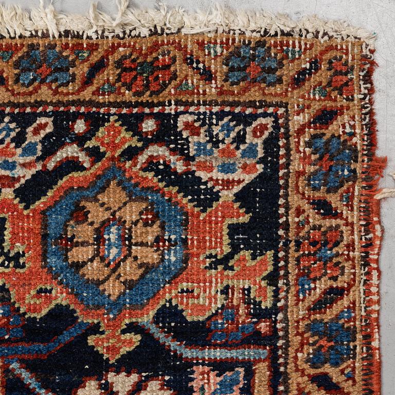 A CARPET, a semi-antique Heriz, ca 356,5-358,5 x 264 cm.
