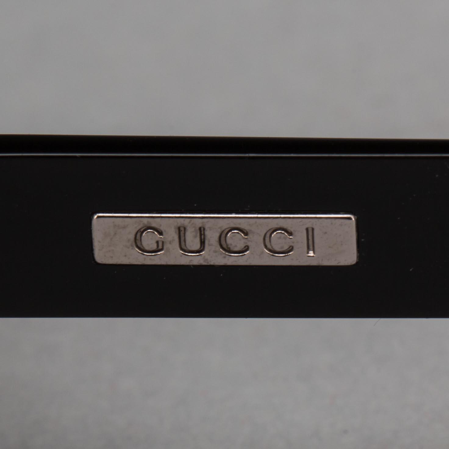 SOLGLASÖGON, Gucci.