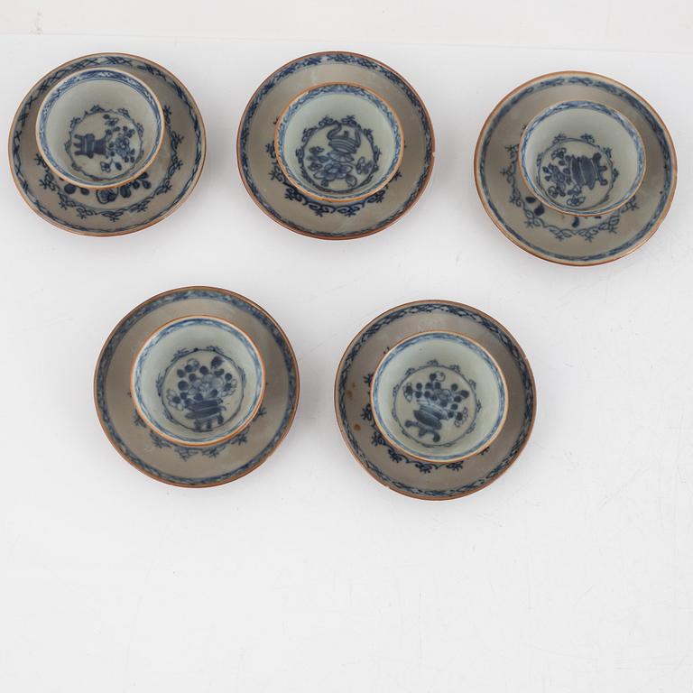 Three Kangxi cups with saucers and five Qianlong cups with saucers, China, 18th century.