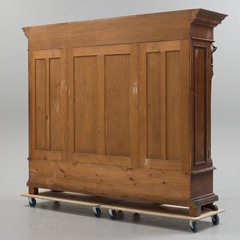 A circa 1900 oak cabinet.