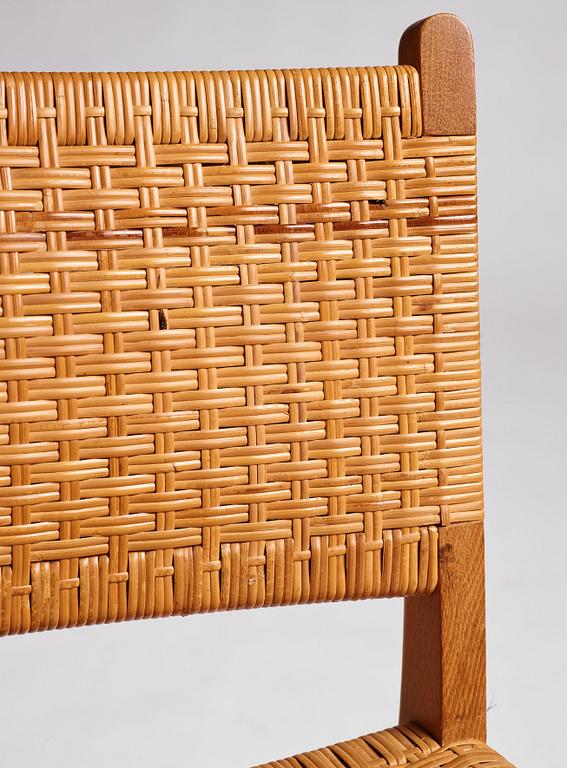 Hans J. Wegner, a set of 10 oak and rattan 'CH31' chairs, Carl Hansen & Son, Denmark 1950s.