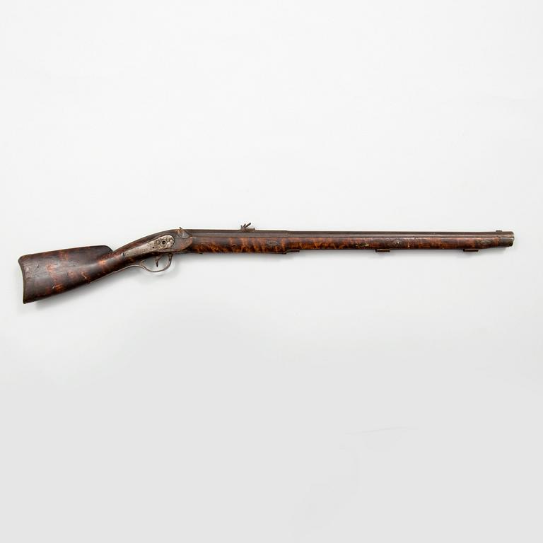 A mid 19th century percussion rifle.