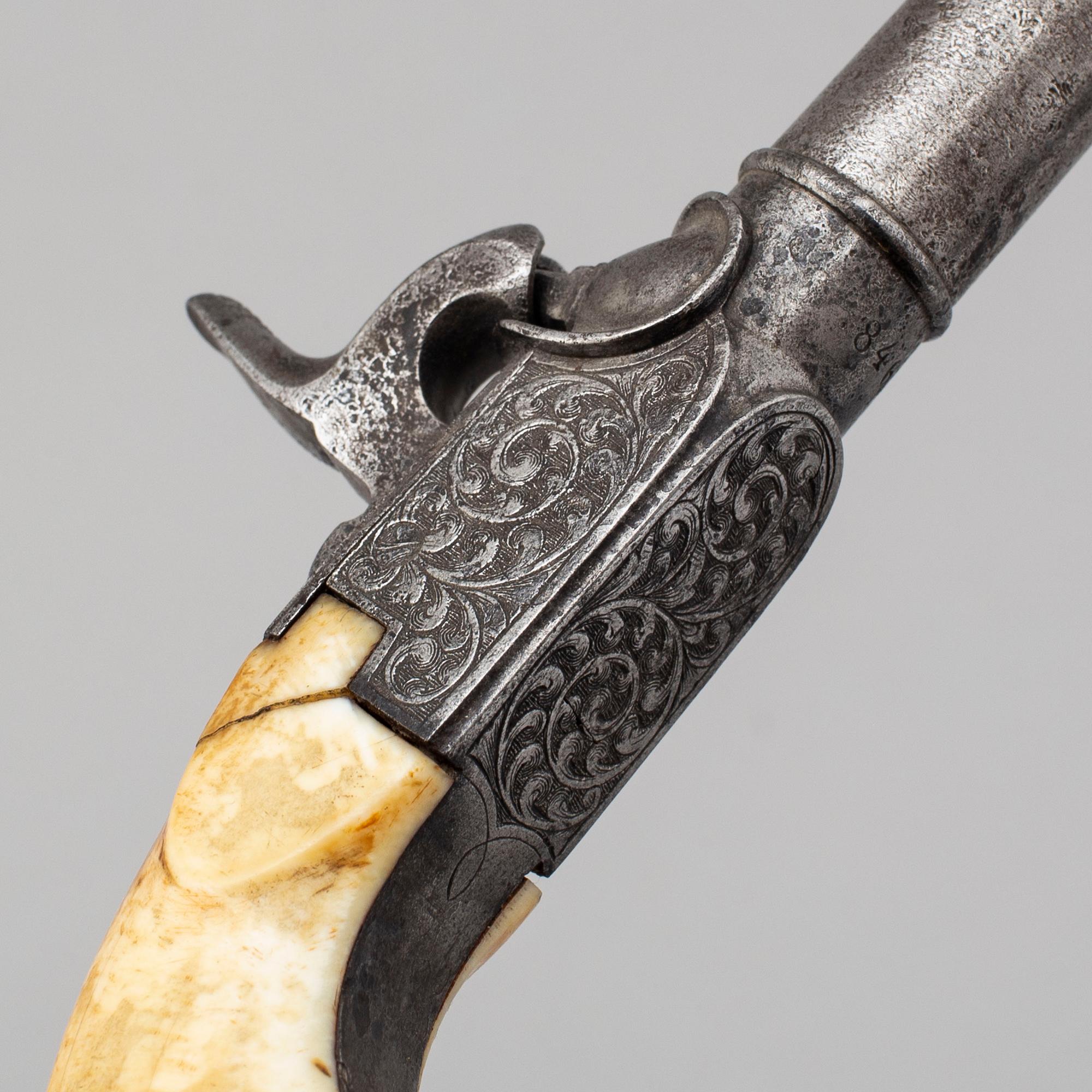 A mid 19th century Belgian rifled percussion pistols with ivory butts in a case.