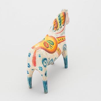 A painted folk art dala horse first half of the 20th century.