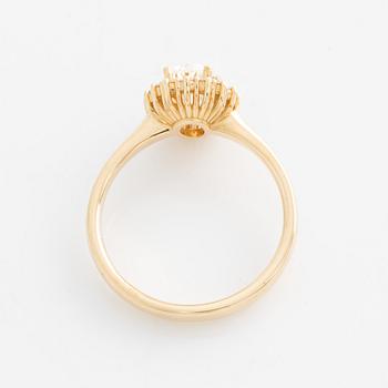 Ring with oval diamond and brilliant-cut diamonds. Accompanied by GIA report.