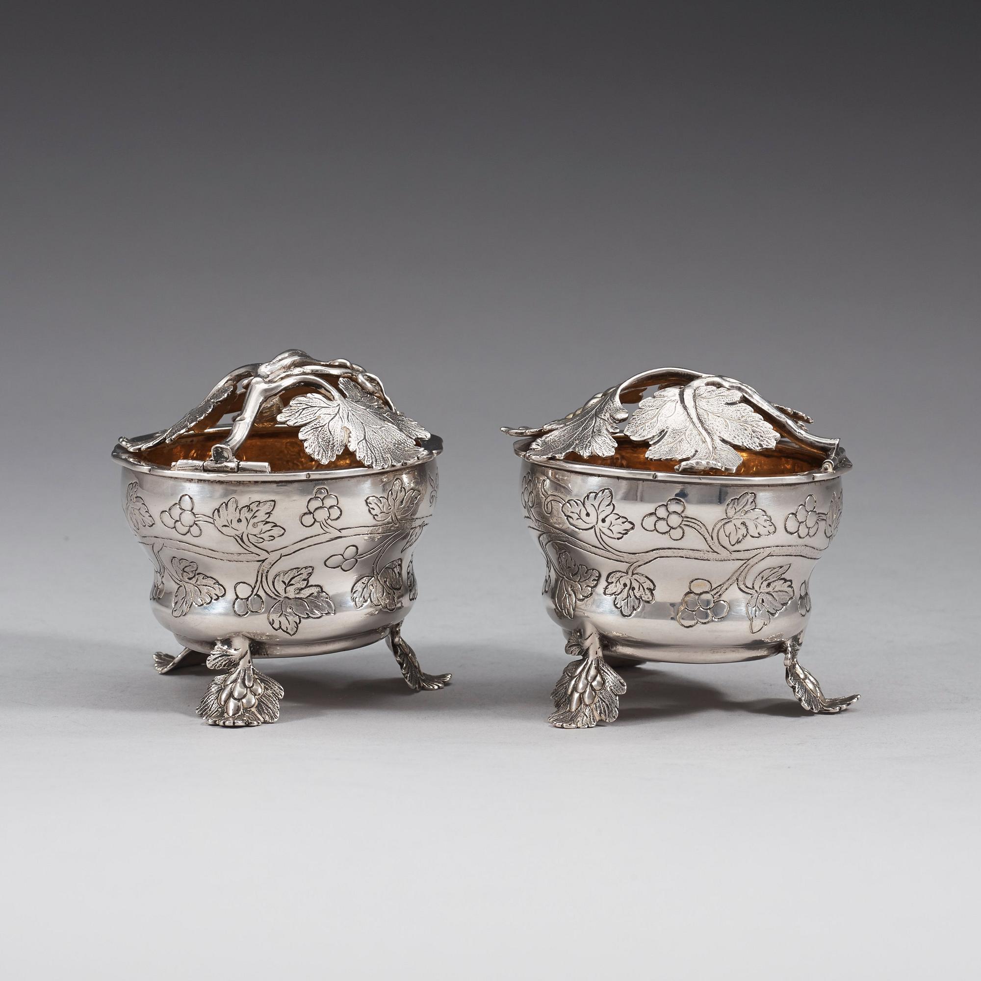A pair of German 18th century parcel gilt jelly-pots, marks of  Johann Christoph Seelingslow, Magdeburg.