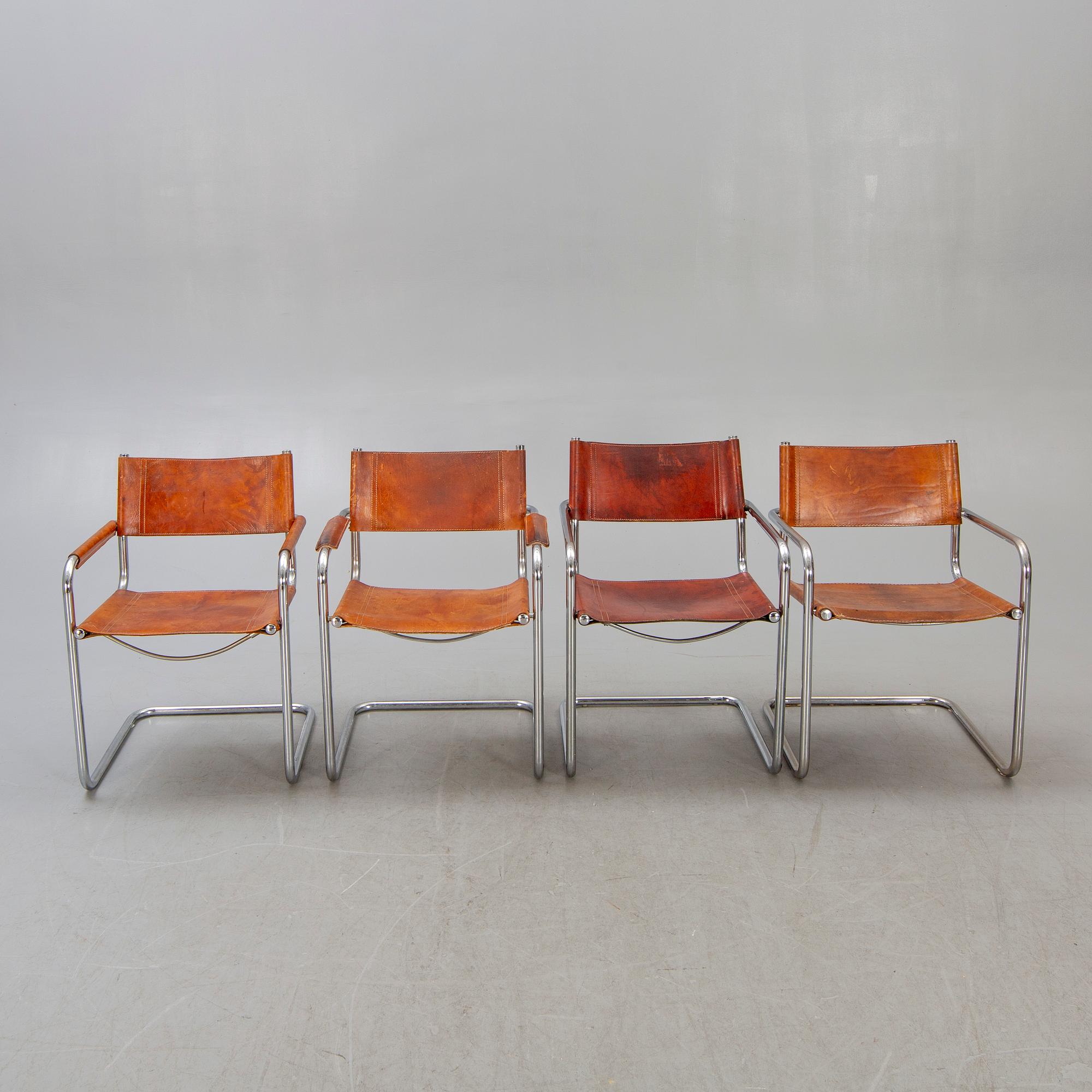 4 late 20th century Italian armchairs.