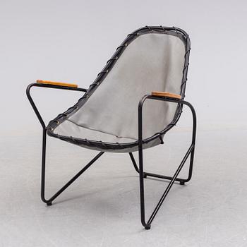 A 1950s easy chair.