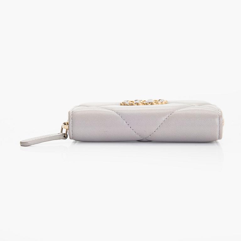 Chanel, A "19 O-coin purse" wallet.