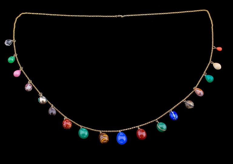 HALSBAND, metall med ägg berlocker, 18 st.