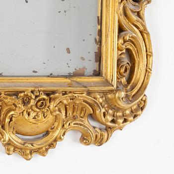 A late 19th century rococo style mirror.