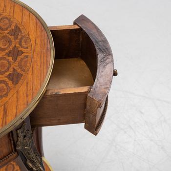 A rococo style table, circa 1900.