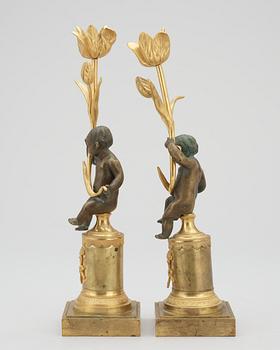 A pair of Louis XVI late 18th century candlesticks.