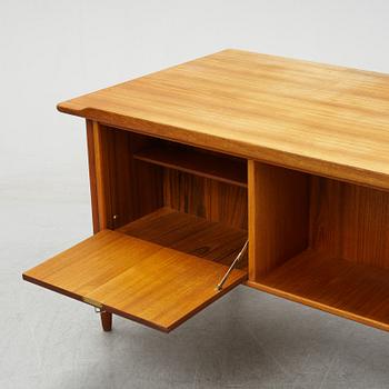 A 1950/60's teak writing desk.