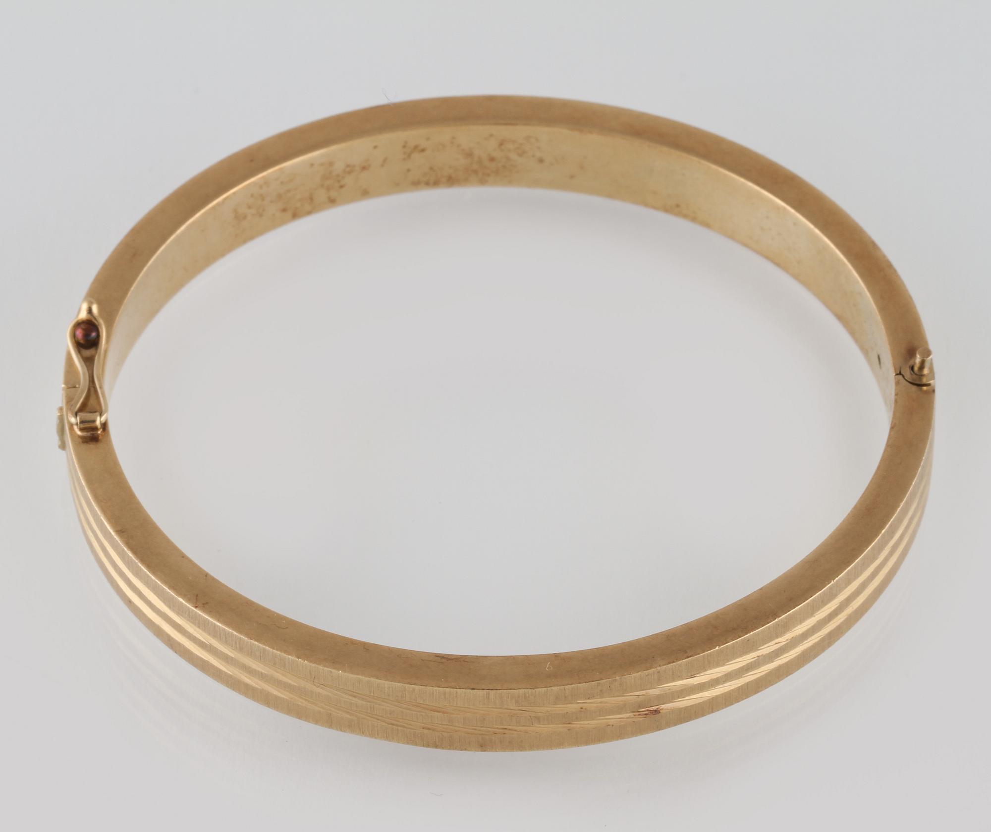 ARMRING, 14K guld, utländska stämplar. Vikt 26,2 gram.
