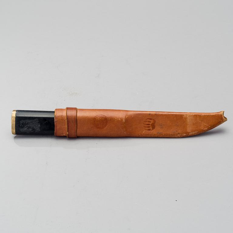TAPIO WIRKKALA, PUUKKO-KNIFE, stainless steel, nylon and brass, Hackman Finland. Model designed in 1961.