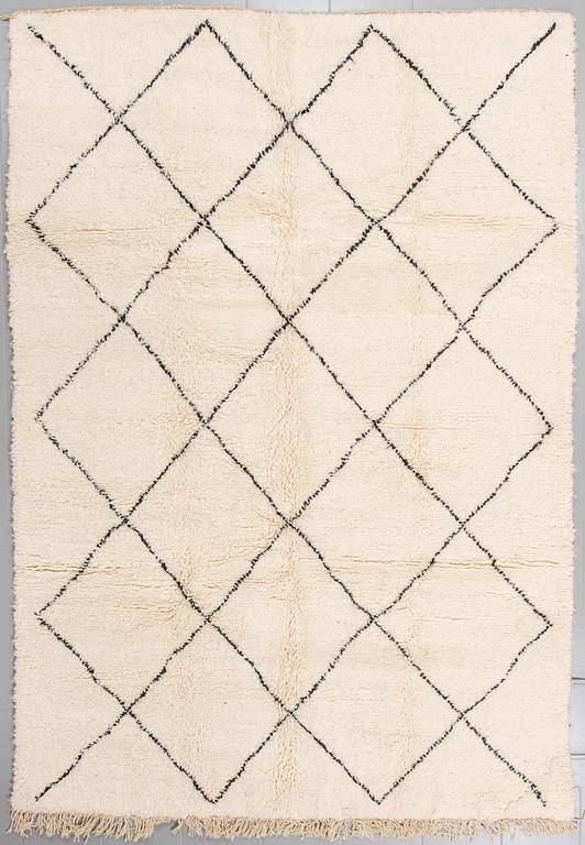 A moroccan rug, 295 x 205 cm.