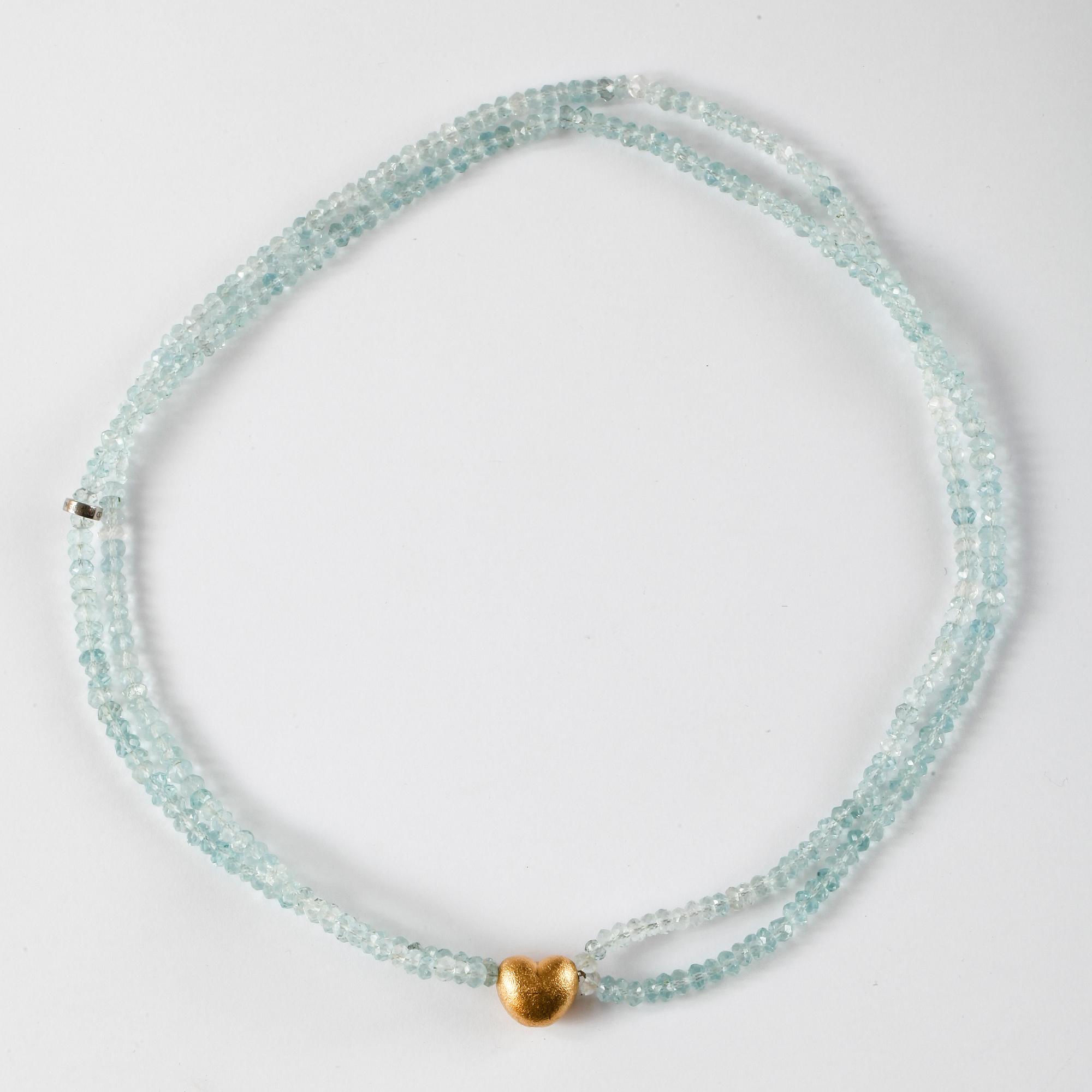 COLLIER, Ole Lynggaard, akvamariner med lås i 18k guld.